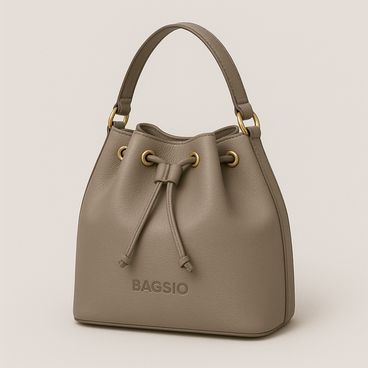 Beige handbag with drawstring closure on a light beige background
