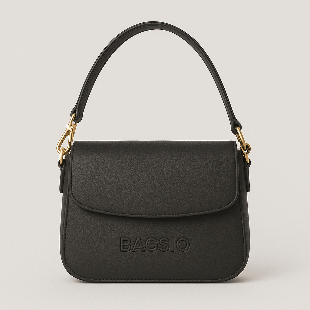 Black handbag with gold accents on a light gray background