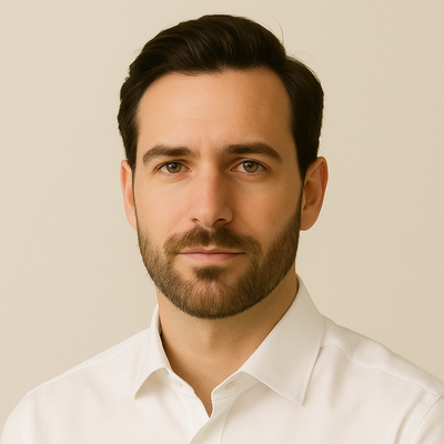 Man wearing a white shirt against a beige background